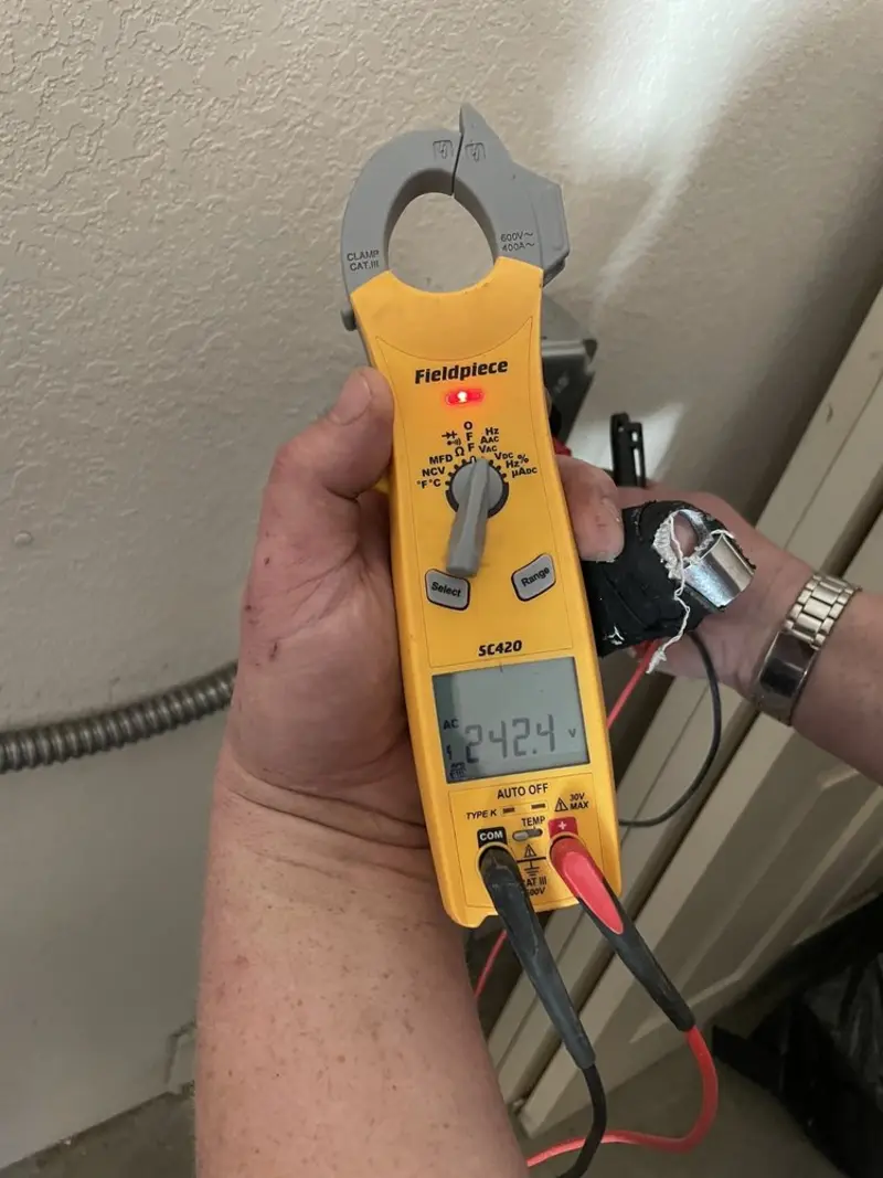Voltage testing with clamp meter during Aluminum Wiring Replacement in Chicopee